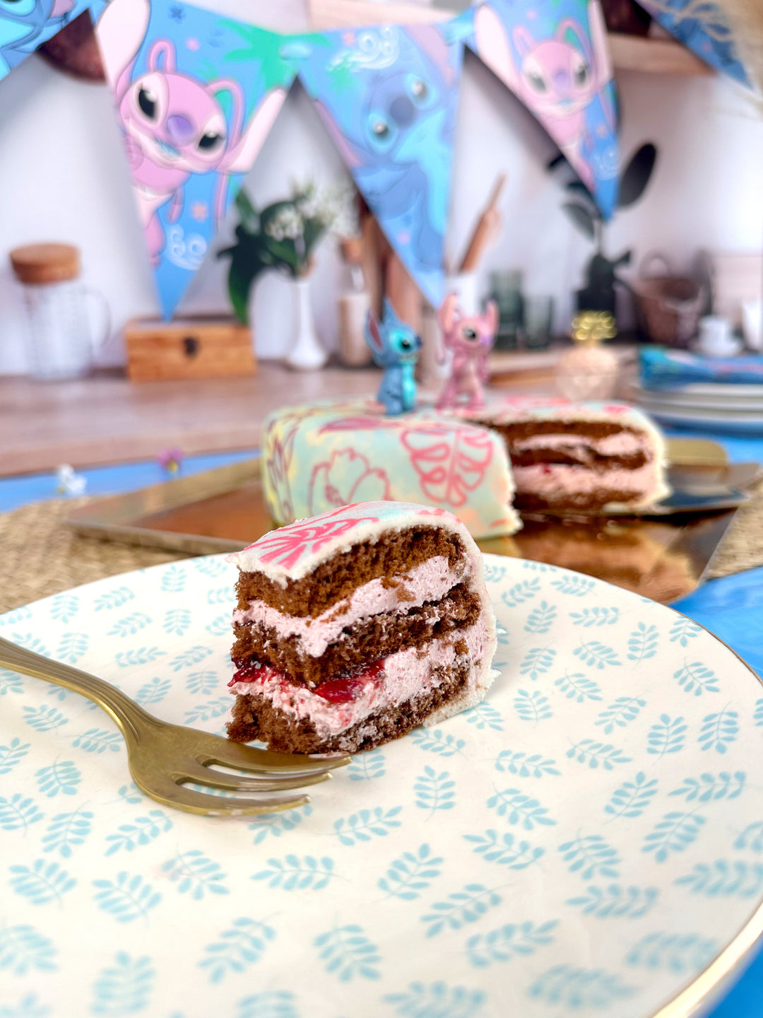 Angel & Stitch® op tropische Deluxe-taart