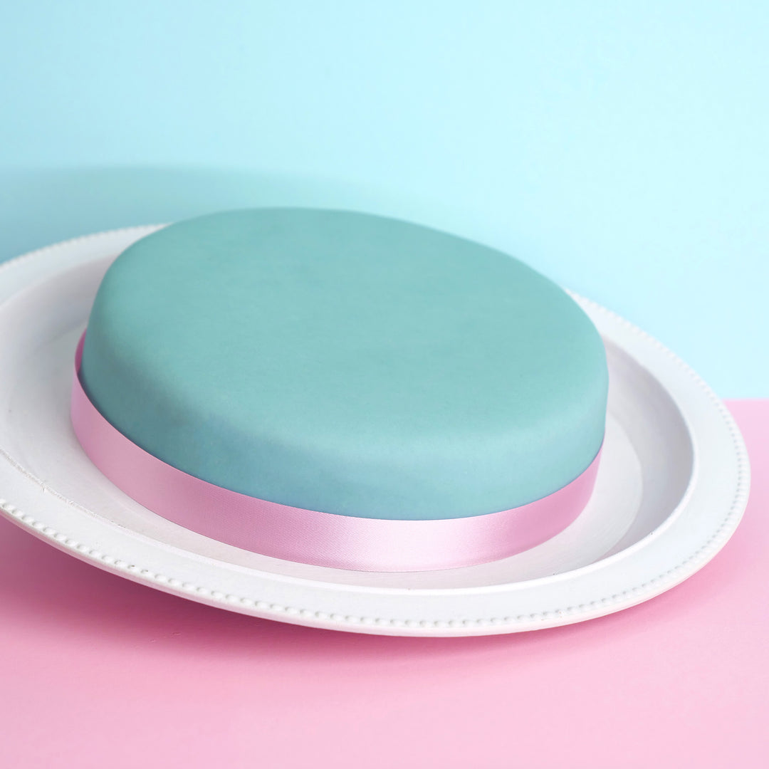 Blauwe taart met taartenlint