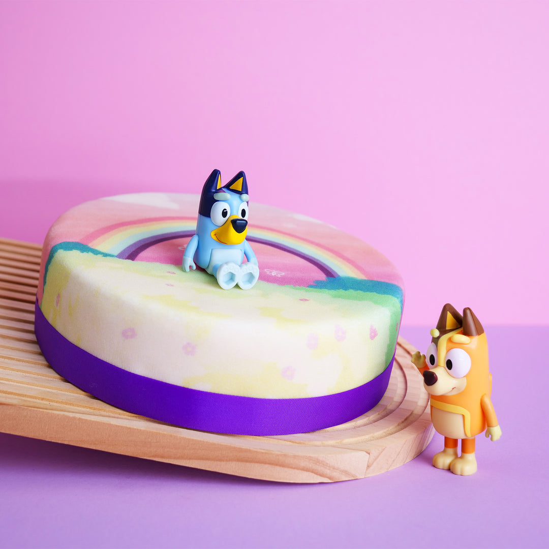 Bluey®-figuur op regenboogtaart