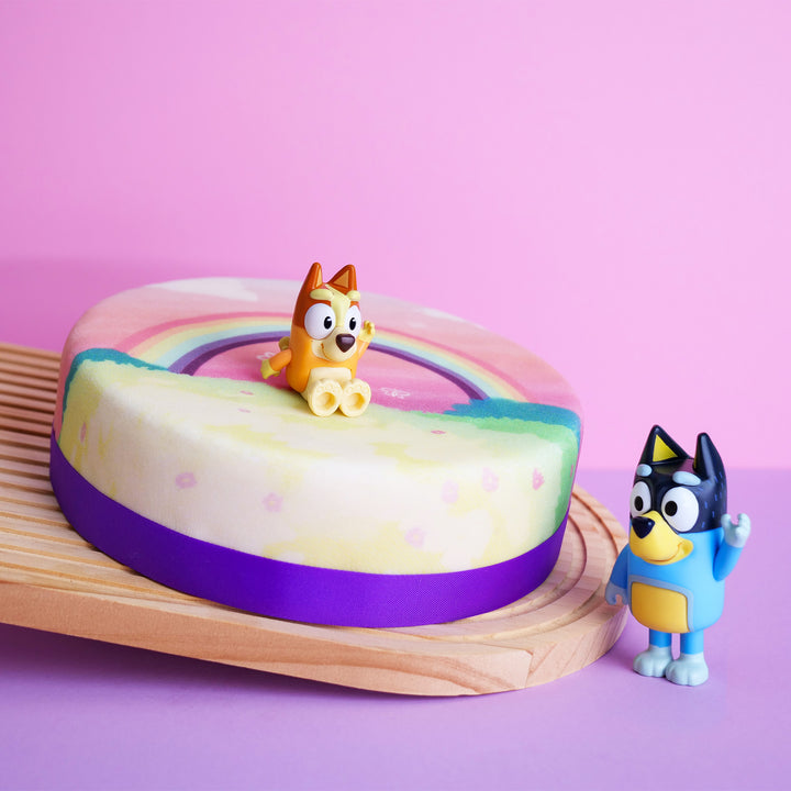 Bluey®-figuur op regenboogtaart