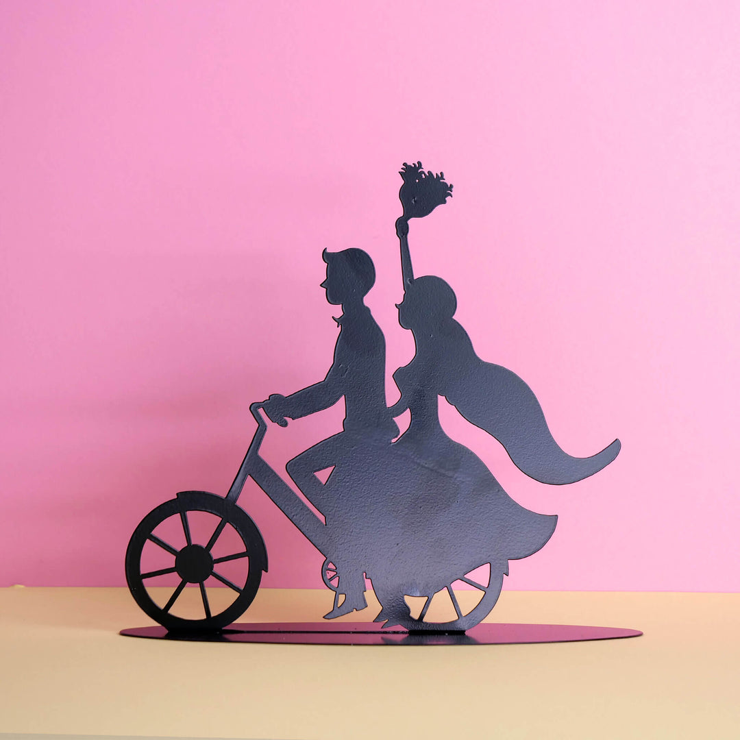 Tortenfiguur – bruidspaar-silhouet op de fiets