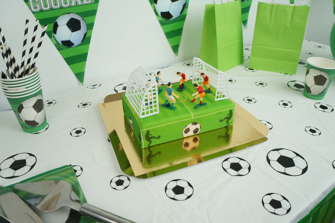 Voetballer op voetbalveldtaart