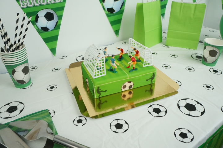 Voetballer op voetbalveldtaart