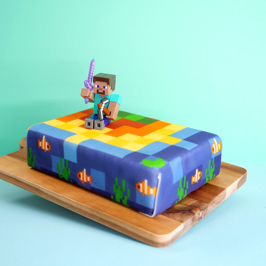 Minecraft®-figuur op kusttaart
