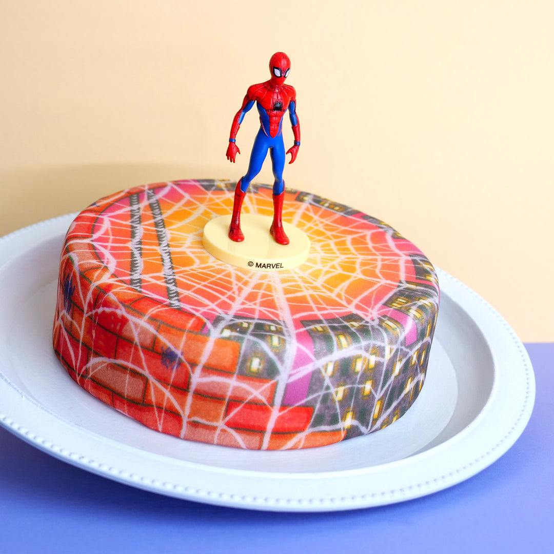 Spider-Man® op een verweven stadsevening-taart