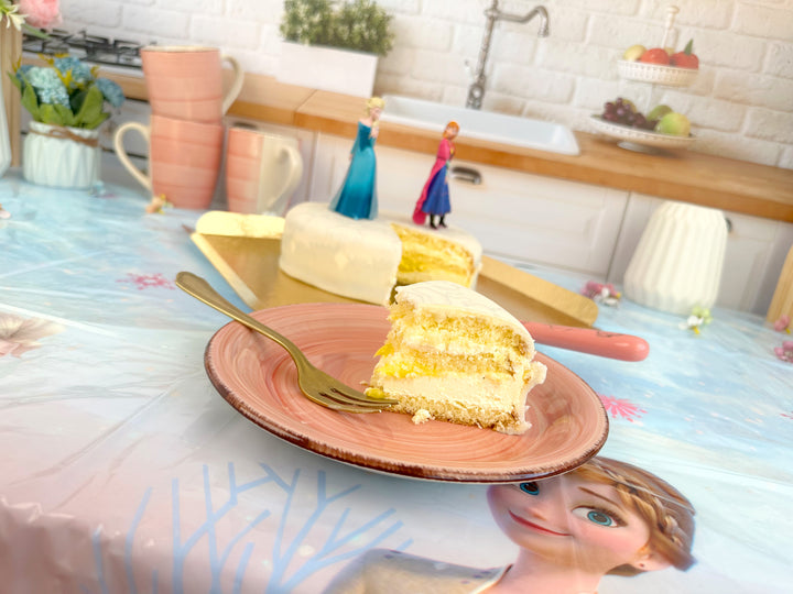 Frozen® Anna® & Elsa® op sneeuwvlok taart