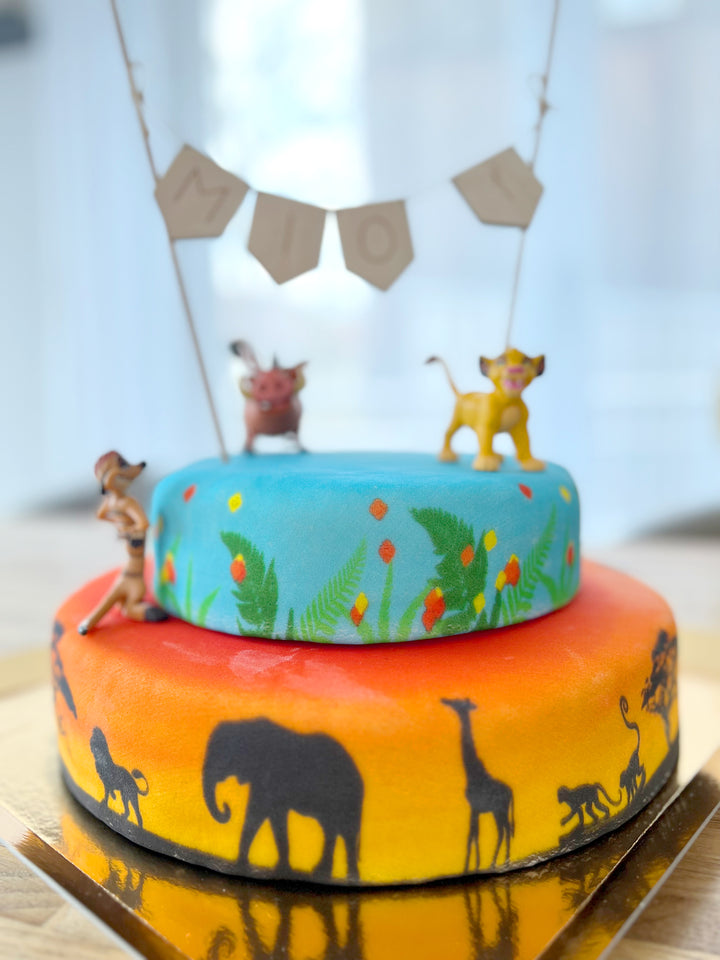 Simba®, Timon® en Pumba®, twee-verdiepingen savanne taart 