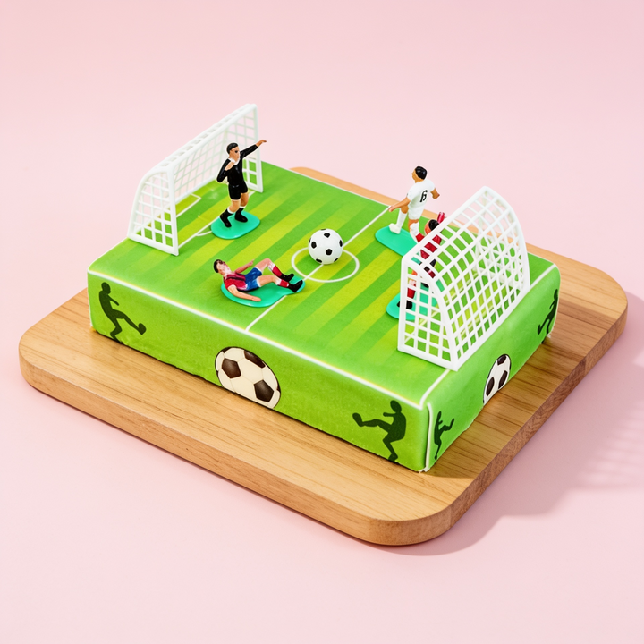 Voetballer op voetbalveldtaart